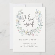 a white card with the words i have moved on it and floral wreaths around it