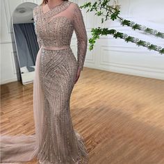 2024 Muslim Gold Mermaid Evening Gown: Elegant Beaded Luxury with Dubai-Inspired Design for Women's Wedding Parties Champagne Mermaid Dress With Sweep Train For Banquet, Sparkling Mermaid Dress For Wedding And Prom Season, Gold Mermaid Dress For Wedding And Prom Season, Gold Mermaid Dress For Prom, Gold Glamorous Mermaid Dress For Banquet, Luxury Gold Gown For Prom Season, Glamorous Gold Mermaid Dress For Banquet, Glamorous Sparkling Mermaid Dress For Wedding, Champagne Mermaid Dress With Sweep Train For Prom