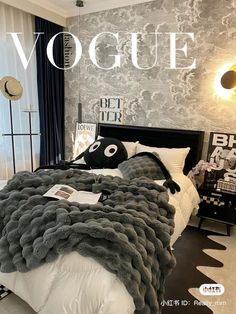 a magazine cover with an image of a cat on the bed