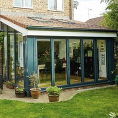 an enclosed patio area with sliding glass doors