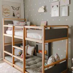 there is a bunk bed with two sets of beds on the bottom and one set below