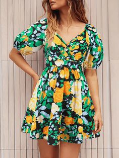 Introducing our Ellerie Floral Wrap Mini Dress, featuring a playful back cut-out, complete with a tie bow for added flair. This dress is perfect for adding some quirk and fun to your wardrobe. Say goodbye to boring, hello to Sienna! Size Guide: Model is 5’6” tall, and has a 33.2” bust, 26.4” waist, & 35.2” hips. She is wearing a S / US 4 / AU 8. This dress is true to size. Material: 100% Polyester Feature: V-neckline. Short Puff Sleeves. Wrap dress. Back Cut-out with tie bow. Floral print. Mini Short Beach Dresses, Printed Beach Dresses, Pyjama Satin, Short Dress Styles, Y2k Summer, Lantern Sleeve Dress, Purple Design, Beach Skirt, Puff Sleeve Dresses