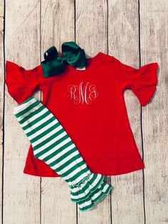 **Leggings and Tunics are sold separately. You must add each one to your cart from the size box to purchase both**Check out this adorable monogrammed Christmas outfit! Perfect for wearing all season long and even after! Great to wear to parties and for pictures to see Santa himself! Also makes for the perfect gift to send to a special grand baby, niece, or friend! Leggings are available in green and white stripe only. The tunic length is in between a shirt and dress and has the cutest bell sleev Balloons Pictures, Shirt And Dress, Christmas Tunic, Easter Dresses For Toddlers, Easter Bunny Girl, Baby Niece, Toddler Christmas Gifts, Girls Blue Dress, Red Tunic