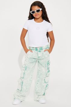 Available In Sage. Cargo Pockets Mid Rise Wide Leg 100% Cotton Elastic Waitband Model Wears Size 10 Imported | Mini Summer Camper Cargo Jean in Sage size 6 by Fashion Nova Kids Pants, Cargo Jeans, Pants Jeans, Jeans Jumpsuit, Girls Jeans, Matching Dresses, Women Girl, Dresses For Sale, Fashion Nova