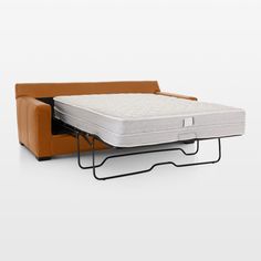 a couch with a pull out bed attached to it's back and side rails