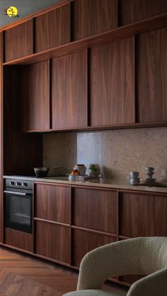 a kitchen with wooden cabinets and an oven