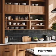 a kitchen filled with lots of wooden cabinets and white dishes on top of counter tops