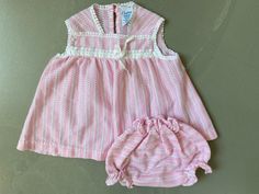 "Vintage Baby 2pc set Pink Outfit/Boho Spring/Summer Outfit/Top & Bloomers Baby Retro set/ by Carters Size 12M Details: Super cute  2PC set, top w/adorable eyelet details, button at back stretch knit. Bloomers elastic at waist, legs. Size: 9-12M 19-22LBS Condition: Great vintage no flaws  contact if need any further images. 50% Cotton 50% polyester  MEASUREMENTS ----------------------- Measurements while garment is laying flat(roughly): Top Chest:13\" inches Length (shoulder to hem): 13\" inches Bloomers Waist: 6\" inches Length (waist to btm): 7\" inches Feel free to contact me with any questions and please read shop policies before purchase FOLLOW ME ON INSTAGRAM: @kid_era_shop" Cute Beach Sets For Spring, Spring Summer Playtime Sets, Cute Spring Beach Sets, Vintage White Sets For Summer, Pink Matching Set For Beach, Pink Beach Sets, Pink Sleeveless Bohemian Sets, Vintage Sets For Spring Playtime, Vintage White Summer Sets