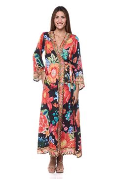 Cover-up your beach-ready look with this lightweight kimono covered in a blooming floral print with a removable tie belt. Open front Long sleeves Three-quarter sleeves Removable tie belt 100% polyester Hand wash, dry flat Imported Spring V-neck Kimono With Belt, Spring Kimono With Tie Waist And Kimono Sleeves, Spring Long-sleeve Belted Kimono, Belted Long Sleeve Kimono For Spring, Spring Long Sleeve Belted Kimono, Floral Print V-neck Kimono For Brunch, V-neck Floral Print Kimono For Brunch, Summer Long Sleeve Belted Kimono, Summer Kimono With Belted Kimono Sleeves