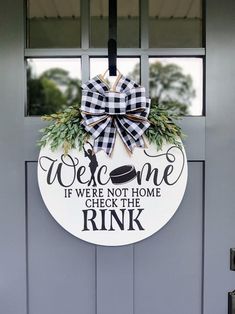 a door hanger that says welcome if we're not home, check the rink