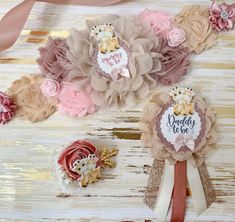 three flower hair clips on top of each other with the words daddy love written on them