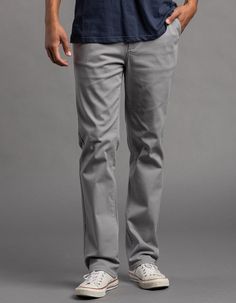 Rsq Slim Straight Chino Pants. Twill Chino With Stretch. Flat Front. Side Slip Pockets. Back Welt Pockets With Rsq Logo On Left Pocket Opening. Button Waist With Zip Fly. Approx Leg Opening: 16". 97% Cotton 3% Spandex. Machine Wash. Imported. Model Is 6'1" Wearing A Size 32x32. Casual Wide-leg Dress Pants With Button Closure, Casual Wide Leg Dress Pants With Button Closure, Gray Casual Pants For Business Casual, Casual Cotton Dress Pants With Belt Loops, Spring Business Casual Full-length Chinos, Spring Business Casual Full Length Chinos, Spring Full-length Chinos For Business Casual, Casual Full Length Summer Chinos, Casual Summer Full Length Chinos