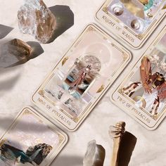 four tarot cards with images of angels and the names of each card on them