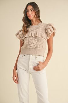 Indulge in the peaceful softness of our sleeveless cable knit sweater top. Designed with intricate ruffle yoke detailing, it adds a touch of elegance to any outfit. Experience the luxury of comfort and style with our Peaceful Pause Sweater. Sweet Top, Crop Top Blouse, Little Dresses, Cable Knit Sweater, Outerwear Sweater, Fall Sweaters, Dusty Blue, Bitter, Sweater Jacket