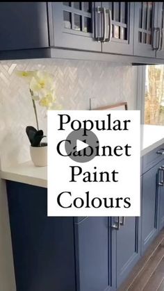 a kitchen with dark blue cabinets and white counter tops that says popular cabinet paint colours