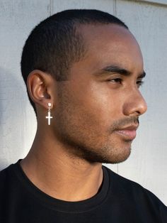 "These sterling silver dangling cross earrings feature 3D Cube post. They have a clean and edgy style that would work for men or women. The cube earring post is 4 mm and it is a perfect size to really make a statement, but not to go overboard. Chain style creates a lot of movement. The cross is on the thicker side to create a balance with the cube post. The earrings are made entirely of sterling silver and have a smooth clean finish, shiny but not too polished. You can choose to buy 1 earring or Mens Dangle Earrings, Dangle Cross Earrings, Earrings Mens, Mens Earrings, Cube Earrings, Face References, Unisex Earrings, Womens Earrings, 3d Cube