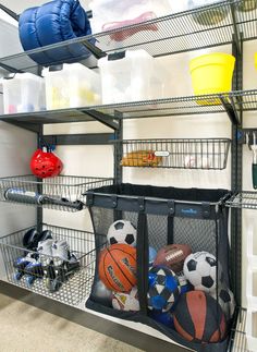 there are many sports balls and toys in the storage area