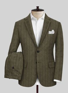 Make a striking statement without overpowering your surroundings with our Highlander Olive Herringbone Tweed Suit—a masterpiece that redefines elegance. Crafted from sumptuous olive green tweed, this suit features a meticulously woven herringbone pattern that adds depth and texture, echoing the beauty of nature itself. Whether you’re enjoying a glass of wine under the stars or engaging in lively conversation amidst the vibrant hues of fall, this suit is the epitome of timeless style.   Look Includes   Highlander Olive Herringbone Tweed Fabric   Two Button Jacket Style  Notch Lapel    Horn Royal Black  Buttons  Single Vent  Three Cuff Buttons  Two Welted Back Pockets on Trousers    Click 'Customize Now' to modify the look if needed.   Lining: Viscose. Formal Tweed Jacket With Herringbone Pattern, Formal Tweed Jacket With Welt Pockets, Luxury Tweed Jacket For Semi-formal Occasions, Fitted Tweed Jacket With Herringbone Pattern, Fitted Tweed Jacket In Herringbone Pattern, Fitted Herringbone Tweed Jacket, Fitted Herringbone Tweed Jacket In Timeless Style, Fitted Timeless Tweed Jacket With Herringbone Pattern, Timeless Tweed Jacket With Welt Pockets