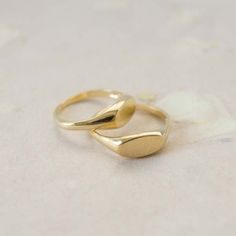 Gold plated brass hand carved signet ring. Gold Brass Engraved Ring For Promise, Matte Gold 14k Gold Rings For Gift, Matte Gold 14k Rings For Gifts, Minimalist Gold Engraved Midi Rings, Minimalist Engraved Gold Midi Rings, Gold Engraved 14k Gold Midi Rings, Gold 14k Engraved Midi Rings, Gold Brass Signet Ring For Anniversary, 14k Gold Oval Midi Rings