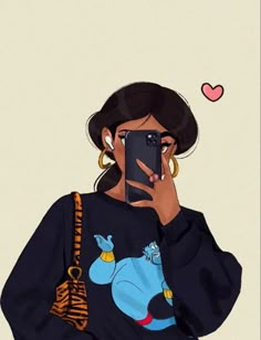 a woman holding a cell phone up to her face while wearing a sweater with an elephant on it