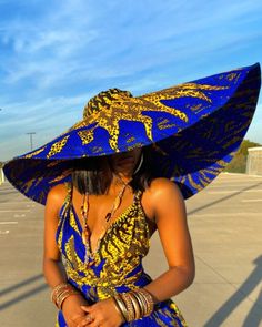 "Keep it cute and chic in our \" Massive Oversized Floppy Kente Print Sun Hat\" this season. This is a one size fits all, lightweight, durable and uniquely sewn hat made from high quality African Ankara print. This hat may help keep your face shaded from the sun as you embark on a full day outdoors and it is sure to turn heads wherever you choose to wear it to. The possibilities are endless with this beautiful well constructed hat! It's the perfect look for your summer vacation, baecation, weeke Oversized Sun Hat, Big Floppy Hat, Beach Hats For Women, Kente Print, African Hats, African Print Maxi Skirt, Oversized Hat, Sun Flare, Beach Hats