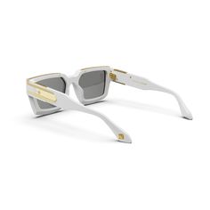 Elevate your style with our "Baller" sunglasses. These shades, in bold white with gold detailing, a GC logo, and unique Guilloché pattern sides, make a statement that reflects your individuality and unmatched confidence. Step out in sophistication and leave a lasting impression. MATERIAL Pure white Acetate frame with gold metal detailing UV 100% UVA/UVB Protection WEIGHT 70 g SIZE 56 □ 20 - 145 INCLUDED IN THE BOX Lens cleaning cloth, soft leather case Luxury White Trendy Shield Sunglasses, Luxury White Anti-reflective Shield Sunglasses, Luxury Yellow Mirrored Lens Sunglasses, Luxury Gold Tinted Sunglasses, Modern Yellow Anti-reflective Shield Sunglasses, Cleaning Cloth, Watch Case, Leather Case, Bracelet Sizes