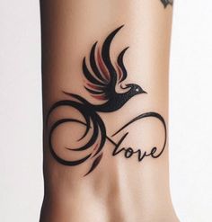 a tattoo on the side of a woman's leg that reads love with a bird