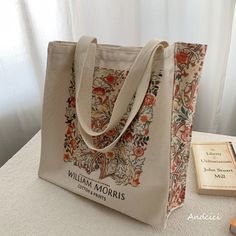 A tote bag with paintings of flowers and trees by the thinker and poet William Morris.
 The original design drawn on the thick canvas gets a lot of looks.
 Plenty of storage capacity and inside pockets are nice.
 Artistic design will make you feel better.





 <Size>



 Height: 36cm

 Width: 36cm

 Gusset: 10cm






 <Material>



 thick canvas fabric Rectangular Floral Print Canvas Bag, Floral Print Rectangular Canvas Bag, Rectangular Canvas Bag With Floral Print, Artistic Beige Canvas Tote Bag, Artistic Canvas Bag For Daily Use With Large Capacity, Artistic Canvas Bag With Large Capacity For Daily Use, Artistic Large Capacity Canvas Bag For Daily Use, Artistic Large Capacity Canvas Bag, Artistic Canvas Shoulder Bag With Large Capacity