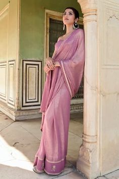 Lavender saree with lurex stripe woven motifs and zari, sequin, cutdana embroidered border. Comes with unstitched blouse piece.
Components: 2
Pattern: Woven, Embroidery
Type Of Work: Stripe, zari, sequin, cutdana
Fabric: Lurex, Chanderi
Color: Purple
Other Details: 
Note: Stitched blouse worn by the model is not for sale
Occasion: Puja - Aza Fashions Lavender Saree, Embellished Saree, Woven Embroidery, Green Sari, Purple Saree, Manish Malhotra, Embroidered Border, Manish, Fashion App