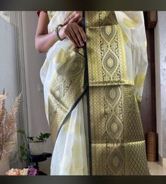 🥰 This Beautiful Banarasi Kora Saree have following details 🥰 🔥 Product Detail: 👉🏻 Design Details: Banarasi Kora saree With Blouse Piece. 👉🏻 Size & Fit: Length: 5.5 meters plus 0.8 Meter blouse piece Width: 1.06 meters (approx) Saree Weight : 0.650 gms 👉🏻 Material and care: Saree Type : Banarasi Saree Fabric: Kora Organza Blouse Fabric: Kora Organza Blouse Type: (Without Stitch and Stitch) Dry-clean first time there after machine wash or hand wash. 👉🏻Shipping:- We ship goods worldwide Semi-stitched Banarasi Silk Saree, Luxury Banarasi Silk Pre-draped Saree For Puja, Traditional Wedding Saree, Gold Semi-stitched Banarasi Silk Pre-draped Saree, Semi-stitched Banarasi Silk Fabric For Puja, Banarasi Silk Semi-stitched Saree For Rituals, Kora Organza Sarees, Golden Saree, Kora Silk Sarees