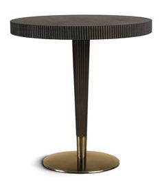 a black and gold table with a round base on an isolated white background for use in interior design