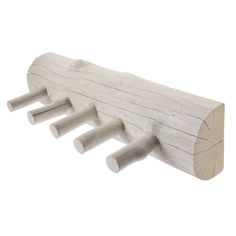 three wooden pegs are attached to the wall