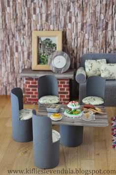 a living room filled with furniture and a clock on the wall next to a fireplace