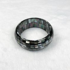 One piece of Black Mother Of Pearl Mosaic Bangle. ･ ｡ﾟ☆: *.☽ .* :☆ﾟ. Handmade Bangle Materials: Black Mother Of Pearl, Resin Chain style: Mosaic Adjustable length: No Can be personalized: Yes Made to Order (Timeframe depends on quantity) ･ ｡ﾟ☆: *.☽ .* :☆ﾟ. Shop Link: www.etsy.com/shop/taichungjewelleryH Handmade Black Round Bangle, Unique Handmade Black Bangle, Artisan Black Bangle Jewelry, Mother Of Pearl Bangle For Gift, Mother Of Pearl Bangle Bracelets, Spiritual Black Bangle Jewelry, Mother Of Pearl Rose, Mother Of Pearl Mosaic, Pearl Resin