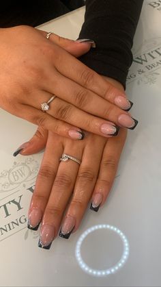 Black tips, silver glitter, nails, hen do nails. ✨💅🏼 Nails That Look Good With Black Dress, Black French Tip Nails Silver Lining, Black Tip With Silver Line Nails, Black And Silver Glitter Nails Acrylic, Prom Nails For Black Sparkly Dress, Black French Tip Nails Sliver, Nails With Black Prom Dress, Club Nails Night, Black And White Nails Acrylic French Tips Silver Glitter