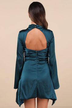 Get ready to be the most stunning sight at any party this season with the Lulus Sultry Elevation Dark Teal Satin Long Sleeve Cutout Mini Dress! Sleek, stretch-woven satin shapes this must-have dress that features long sleeves with flaring cuffs, flowing into an overlapping crisscross design that creates a chic mock neckline. Flirty cutouts at the front and back sit above the figure-flaunting silhouette that boasts ruching along the sides and continues down to an A-line mini skirt with a draping, asymmetrical hem. Button-loop closures secure the neckline. Hidden zipper/clasp at back. Fit: This garment fits true to size. Length: Mid-thigh. Size medium measures 44.5" from shoulder to hem. Bust: Great for any cup size. Waist: Fitted - very fitted at natural waist. Hip: Not Fitted - fuller skir Teal Satin Dress, Satin Dresses Long Sleeve, Cutout Mini Dress, Satin Long Sleeve, Mock Neck Dress, A Line Mini Skirt, Mock Neckline, Dark Teal, Cutout Dress