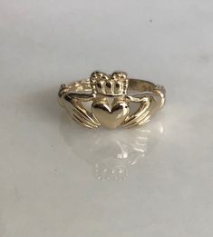 14k yellow gold claddagh ring, symbolizing friendship, loyalty and love. A beautiful ring for any man or woman. Call for sizing options. Finger size 9 Grams 5.8 19th Bday, Gem Tattoo, Gold Claddagh Ring, Grandmas Jewelry, Claddagh Ring, Claddagh Rings, Dope Jewelry, Rings Diamond, Pretty Jewelry