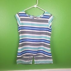 This Is A Brand New Top From The Limited On A Size Xs. No Flaws, Rips Or Stains. Its A High Low Top With The Front Being Short Than The Back. Excellent Top For Work. Len 21/ Back 25 Chest 16 Waist 17 Striped Sleeveless Stretch Top, Sleeveless Striped Stretch Tops, Stretch Sleeveless Striped Top, Summer Sleeveless Striped Top, Striped Sleeveless Summer Top, Blue Short Sleeve Stretch Tank Top, Striped Sleeveless Blouse For Summer, Striped Sleeveless Top For Summer, Being Short