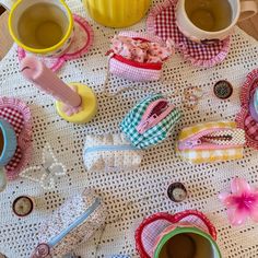 several teacups and other items on a table