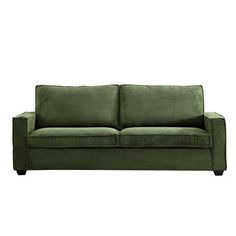 a green couch sitting on top of a white floor