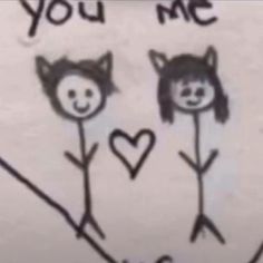 two cats drawn on the side of a wall with words you me and u s