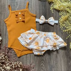 Precious Baby Girl 3pc Outfit Includes Golden Yellow Ribbed Romper With Ruffles And Buttons Down Front, Sunshine Printed Skirted Bummie / Bloomers, & Matching Headband. Cute Yellow Sets For Summer, Cute Yellow Summer Sets, Cute Yellow Summer Set, Yellow Sets For Playtime In Summer, Yellow Sets For Summer Playtime, Yellow Summer Playtime Sets, Yellow Playtime Sets For Summer, Cute Yellow Sleeveless Sets, Playful Yellow Fitted Sets