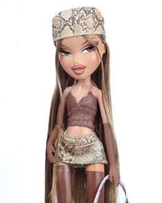 a doll with long hair holding a white purse and wearing a brown top, skirt and boots