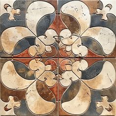 four tiles with different designs on them