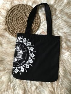 "~~ MANDALA DESIGN  ART TOTE BAG WITH ZIPPER / BLACK LINEN FABRIC BAG / TOTE WITH TOP HANDLE  ~~ Lightweight tote bag totally hand painted and well sewed, much durable. This handmade mandala art bag recommended for daily use.  # Dimensions :  *Bag Height 14\" x Width 14\"                             *Top Handle Height 12\" # Materials / Color : * Linen Fabric - Black ( Outside )                                     * Lace Cotton Fabric - Black ( Inside ) # Paint  : Fervicryl Acrylic Fabric Paint Top Painting Designs, Totes Bag Painting, Painting On Cotton Bags, Mandala Art On Fabric, Painting Ideas For Bags, Bag Material Fabrics, Art Bag Design, Designing Ideas Fashion, Canvas Bag Ideas Design