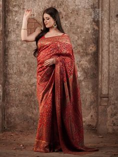 Red Kani Saree in silk fabric is accentuated with Kani weaving all over its body and borders & pallu in traditional motifs like paisleys and flowers with a touch of zari thread to add a hint of shine. It is accompanied with Kani blouse piece in contrasting colour with booti pattern.  The design inspiration for this Pashmina Silk saree is drawn from the heritage weaves of ancient Pashmina shawls from our history that dates back to the Mughal era.  Kani is an ancient and traditional craft of Kashm Sari Traditional, Outfit Traditional, Pashmina Silk, Red Crafts, Festive Wear, Wool Shawl, Pashmina Shawl, Ethnic Wear, Festival Wear