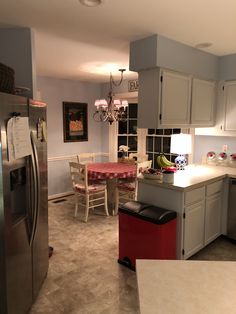 the kitchen is clean and ready to be used for dinner or other entertaining purposes in someone's home