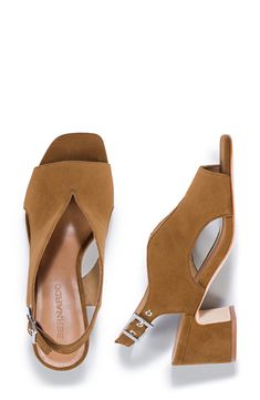 Curvy cutouts and a deep vamp distinguish this leather slingback pump set on a cushioned footbed and lofty block heel. 2" heel Cushioned footbed Leather upper, lining and sole Made in Brazil Brown Slingback Pumps With Block Heel For Work, Chic Slingback Pumps With Wooden Block Heel, Modern Block Heels With Removable Insole, Leather Block Heels With Wooden Heel For Evening, Evening Leather Block Heels With Wooden Heel, Modern Block Heels With Low Wooden Heel, Stacked Block Heels With Open Heel For Work, Modern Low Block Heels With Wooden Heel, Modern Slingback Sandals With Stacked Block Heel