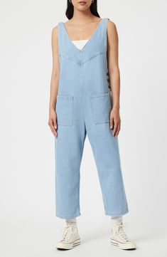 Rock a casual-cool vibe in this lightweight denim jumpsuit designed with front patch pockets and a cropped length. 23 1/2" inseam; 17 1/2" leg opening Side button closure Deep V-neck Sleeveless Front patch pockets 76% cotton, 24% rayon Machine wash, dry flat Made in Turkey Light Indigo Jeans With Pockets For Summer, Light Indigo Jeans For Summer, Casual Denim Jumpsuit With Pockets In Medium Wash, High Rise Summer Overalls With Pockets, Blue Straight Leg Utility Denim Jumpsuit, Casual Light Wash Denim Jumpsuit With Pockets, High Rise Denim Jumpsuit With Pockets In Utility Style, Blue Utility Denim Jumpsuit With Straight Leg, High Rise Medium Wash Jumpsuits And Rompers With Pockets