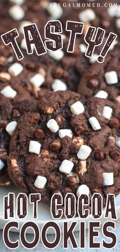 chocolate cookies with marshmallows on top and the words tasty hot cocoa cookies